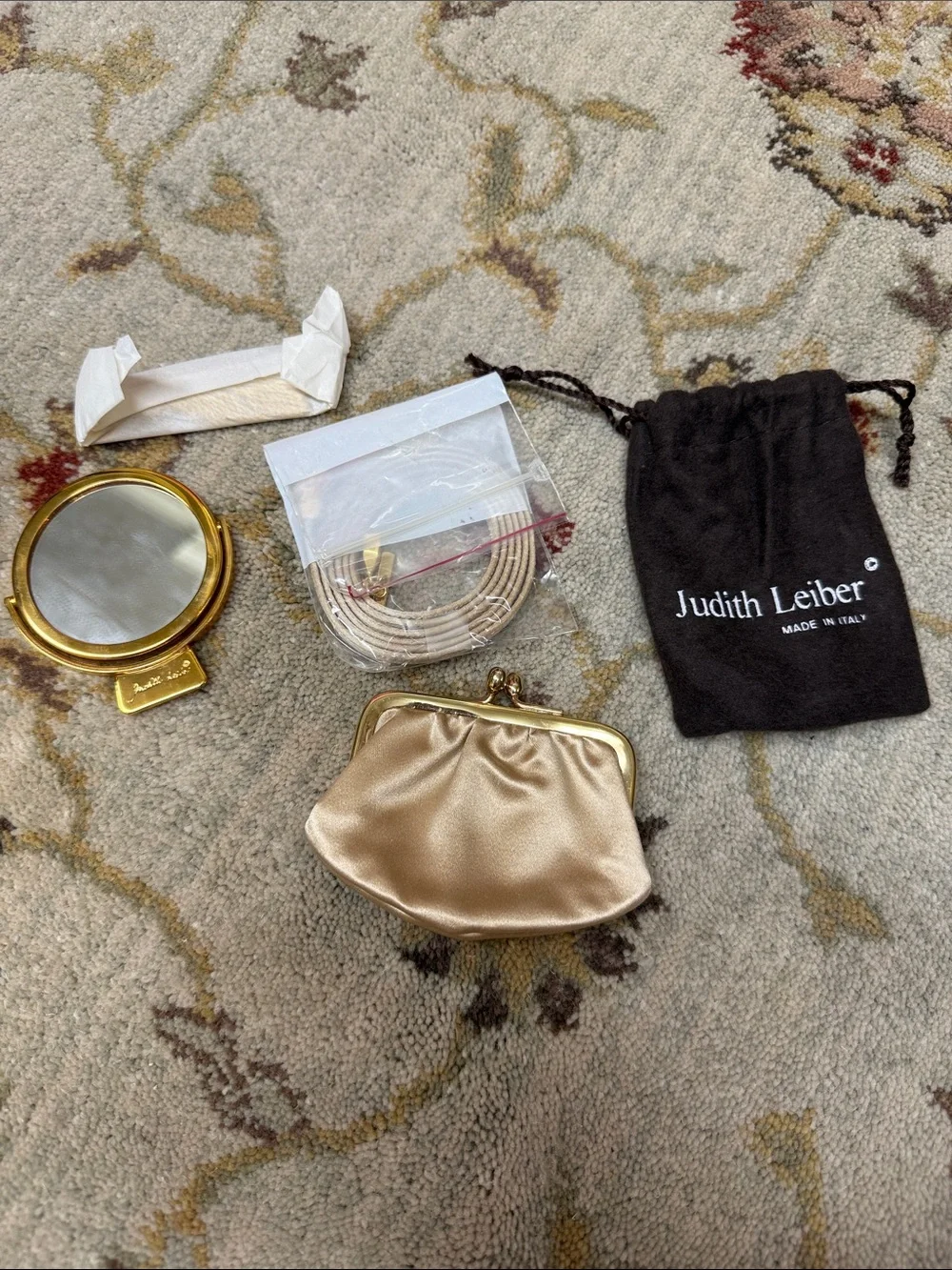 Judith Leiber chic champagne
